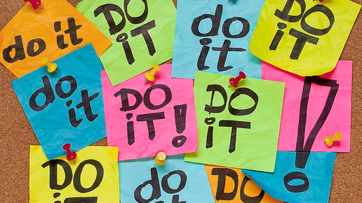 Cork Board with multiple post-it notes saying "Do it!"